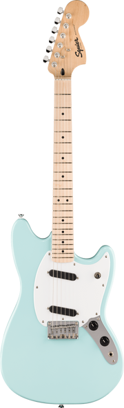 Electric guitar with a light blue body and white pickguard on a green background