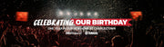 A concert-style crowd scene with confetti in the air and a large red-and-white text overlay reading 'CELEBRATING OUR BIRTHDAY' and 'ONE YEAR IN OUR NEW HOME AT CHARLESTOWN.' Small Yamaha and Roland logos appear near the bottom center.