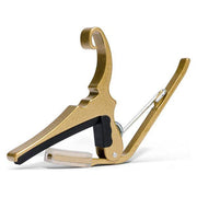 Kyser Quick-Change Acoustic Guitar Capo - Gold Side View with Spring-Loaded Trigger