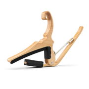 Kyser Quick-Change 6-String Acoustic Guitar Capo - Maple Finish Angled View Showing Trigger Handle and Protective Rubber Padding