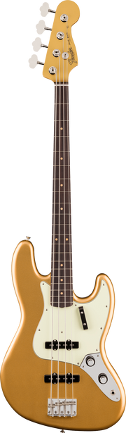 Electric bass guitar with a beige body and white pickguard on a brown background